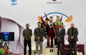 Rahmat Erwin Abdullah setelah penerimaan medali di International Weightlifting Federation (IWF) Grand Prix II Qatar Open di Doha, Minggu (10/12/2023) dini hari. Foto: NOC